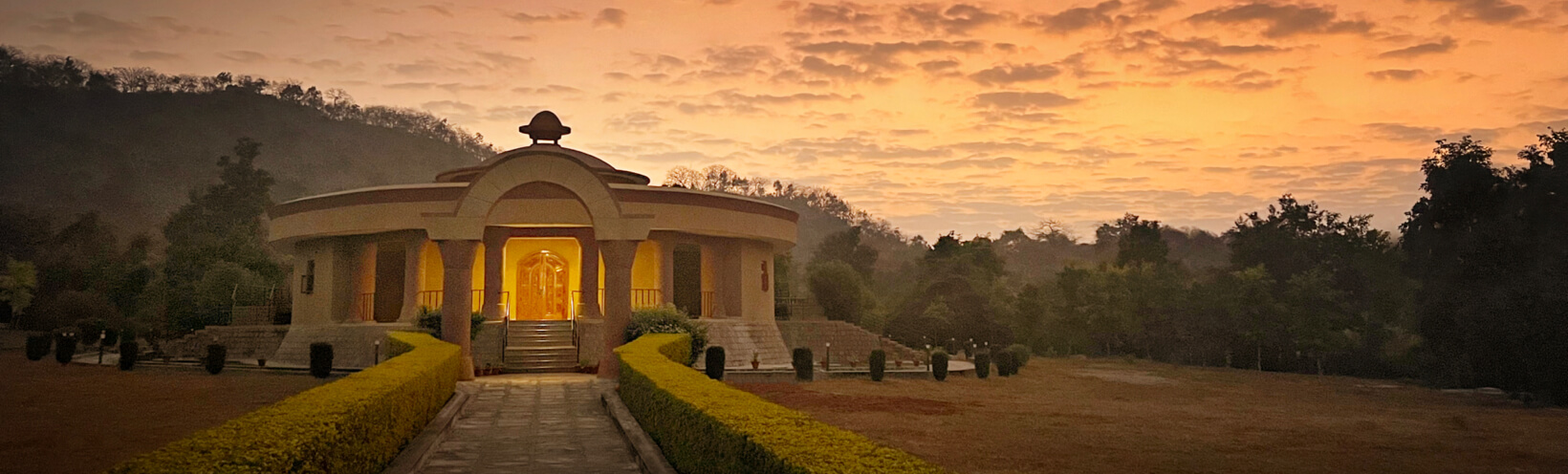 khjaurho shrine sunset lighter banner - Himalayan Institute
