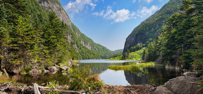 adirondacks excursion featured lake in valley - Himalayan Institute