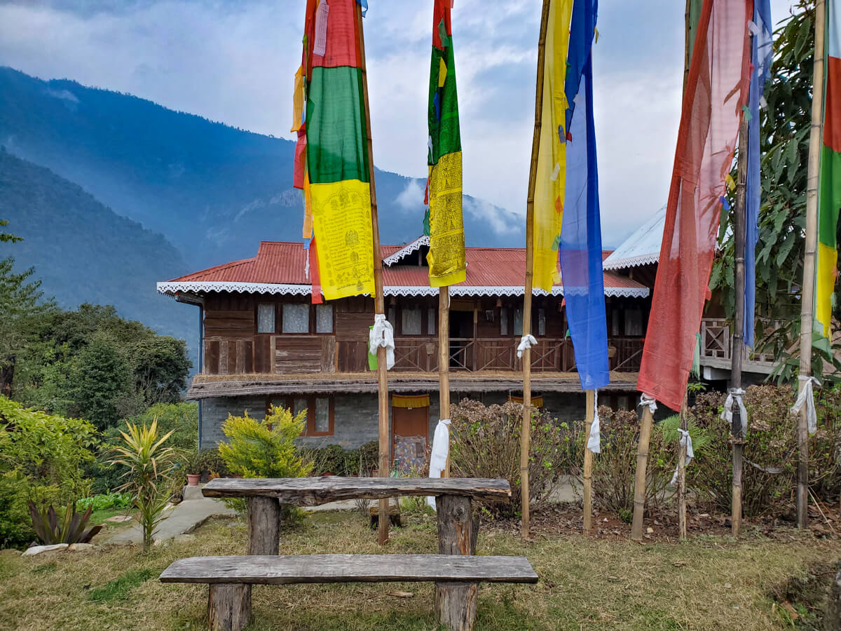 sikkim house with flags - Himalayan Institute